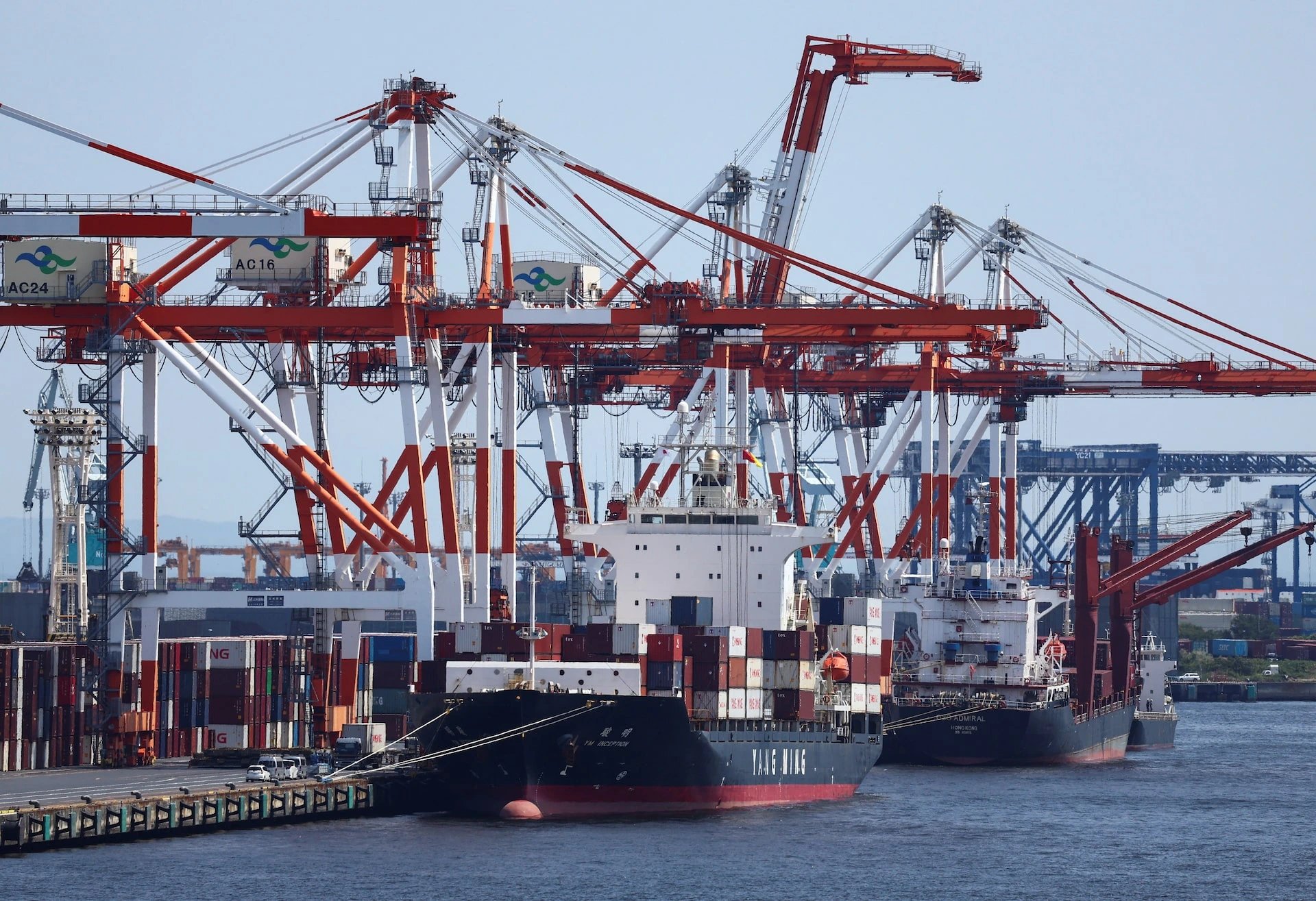 Japan exports climb to record on chip demand, imports hit monthly record on oil costs
