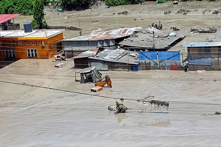 Nepal flash flood kills eight, damages roads and power facilities