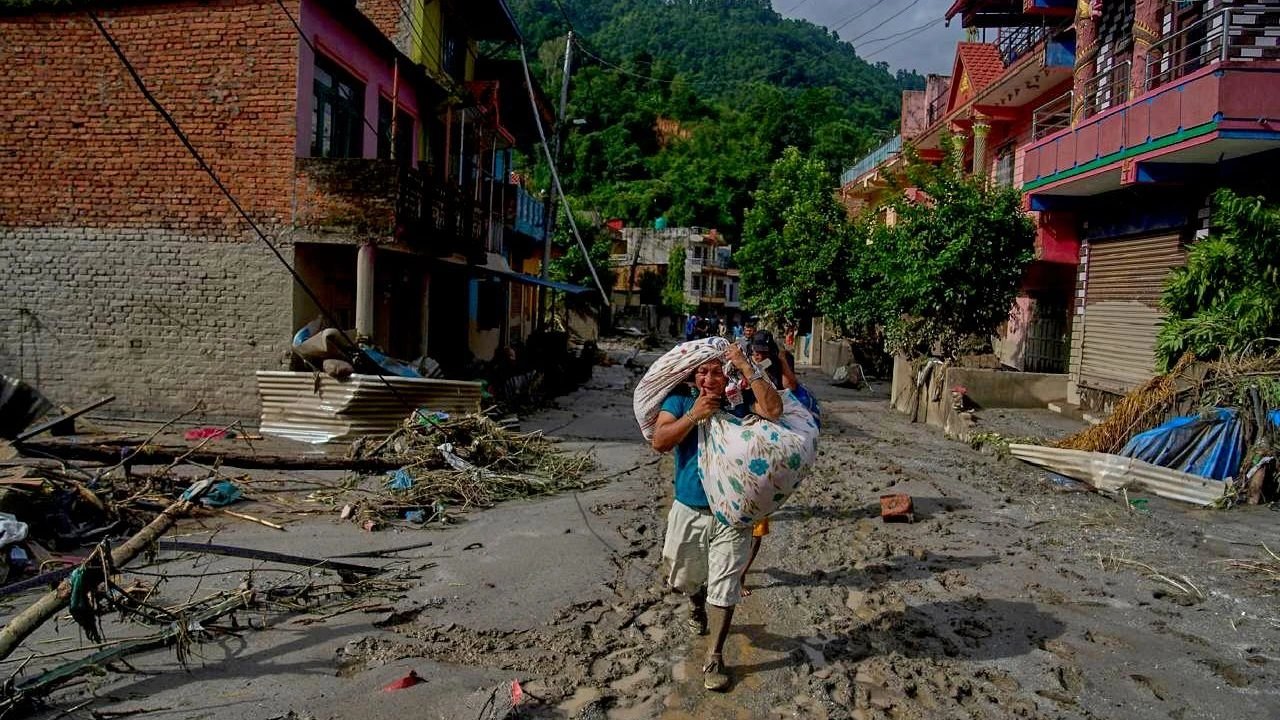 Nepal rescuers find girl alive under debris three days after flood