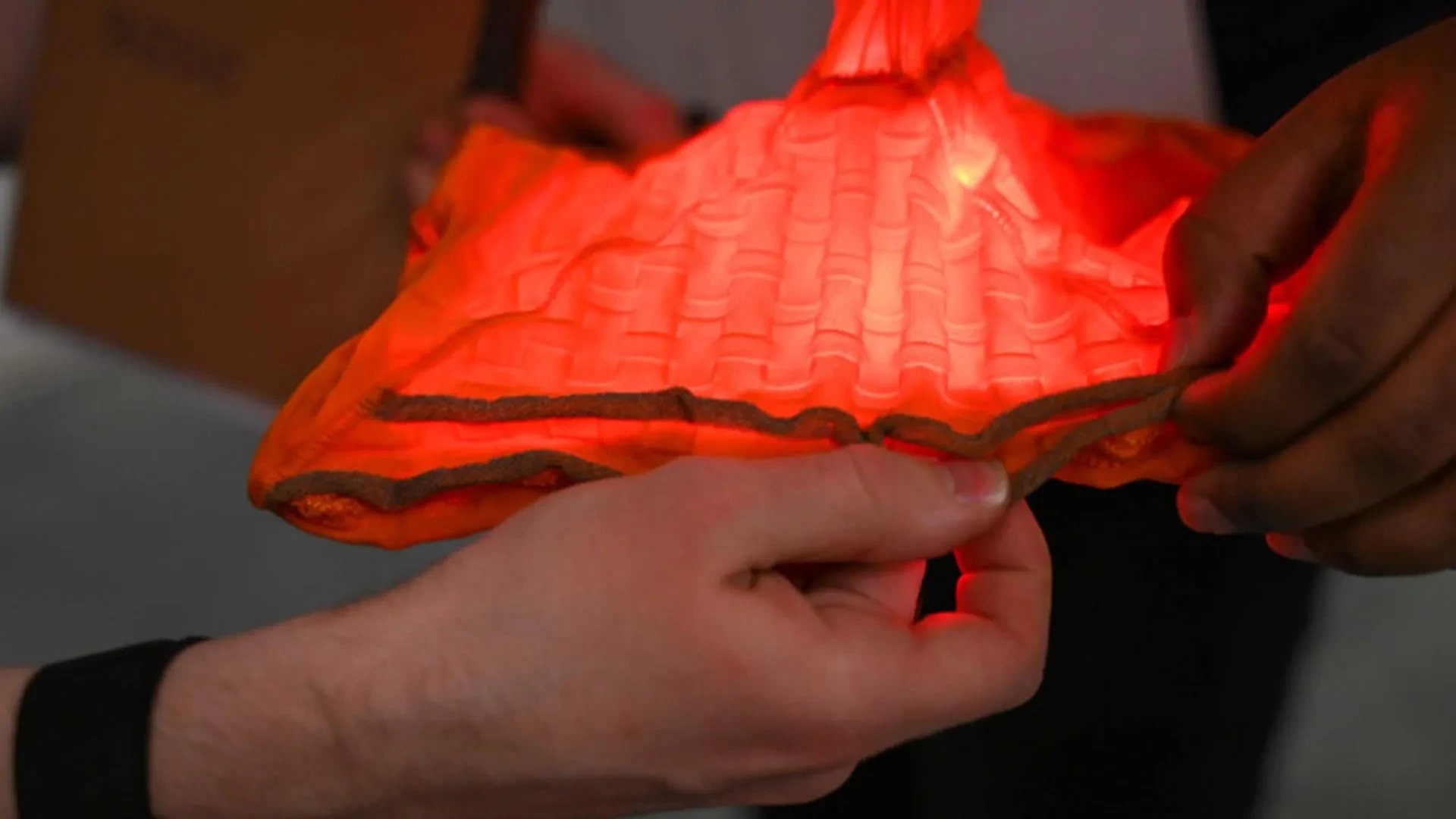 Harvard engineers knit shape-shifting fabrics that snap between stable forms