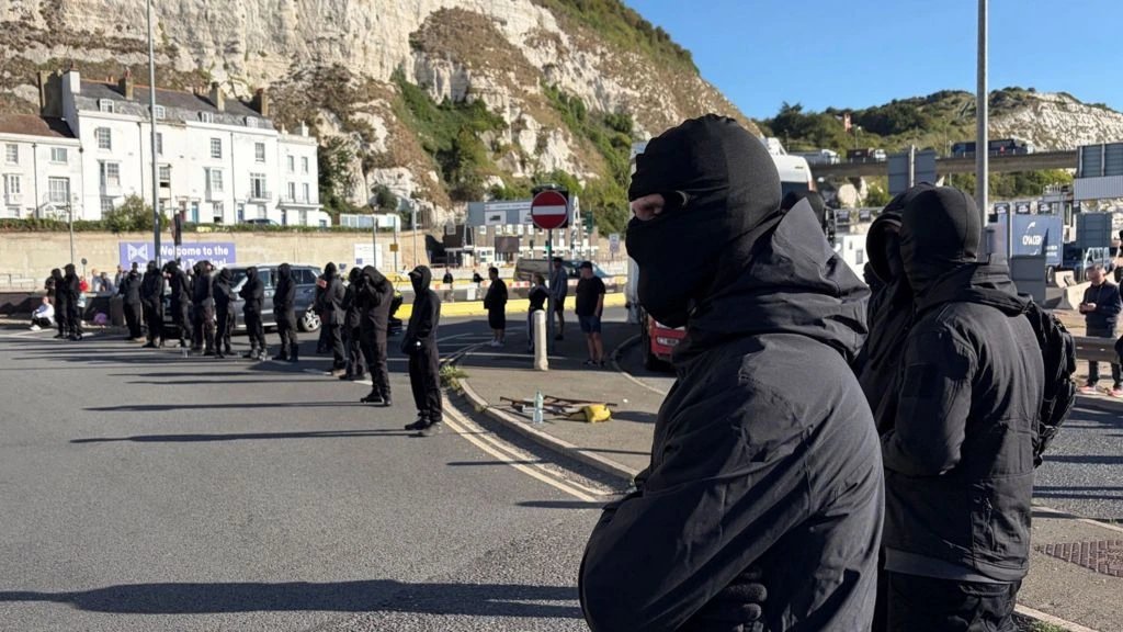 Masked protesters block traffic at Port of Dover