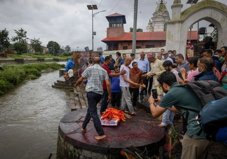 Nepal families cremate effigies as flood missing exceed 4,900