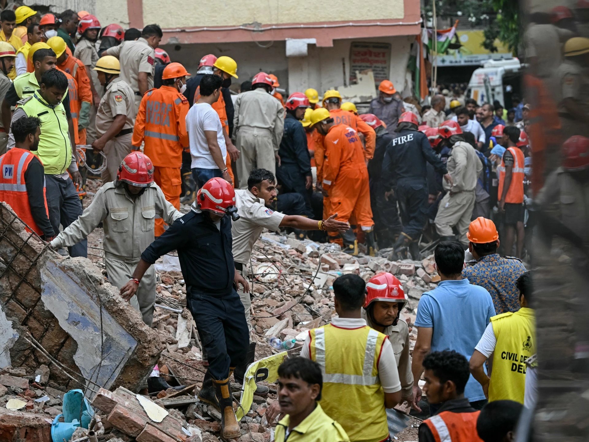 Delhi building collapse kills six, traps up to 40 near university