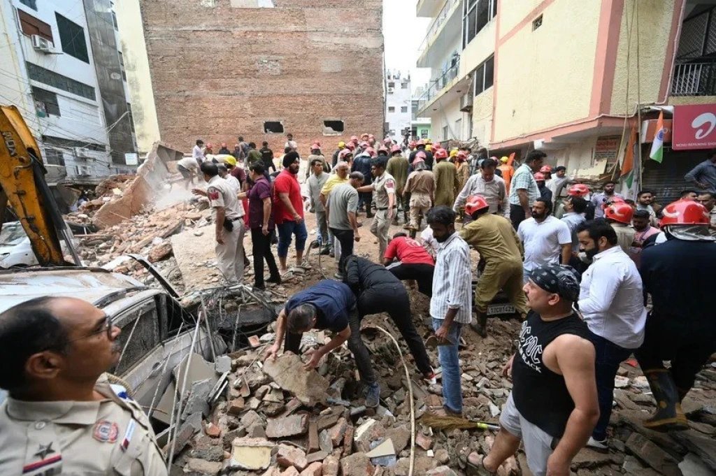 Delhi five-storey building collapses, killing three and trapping 50