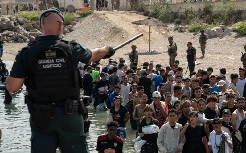 Spain says 13,000 migrants remain in Ceuta after July border crossings