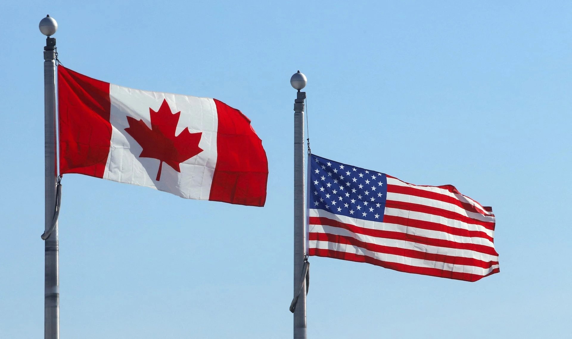 US tariffs on Canadian goods take effect as Quebec pauses independence push