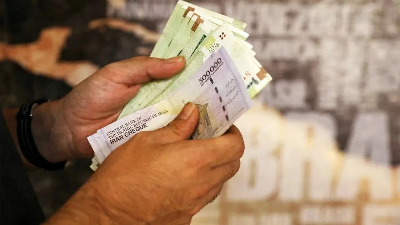Iranian rial hits record low as dollar tops 2.1 million