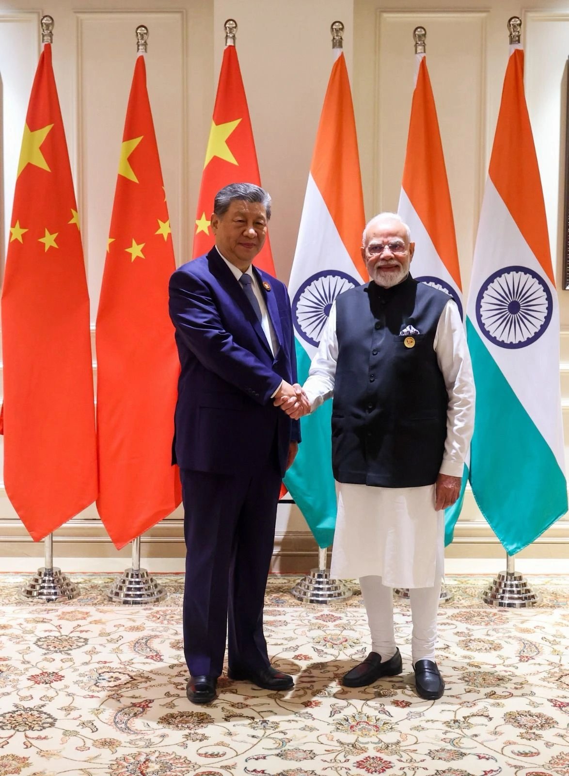 India-China ties improve before summits, but mistrust persists