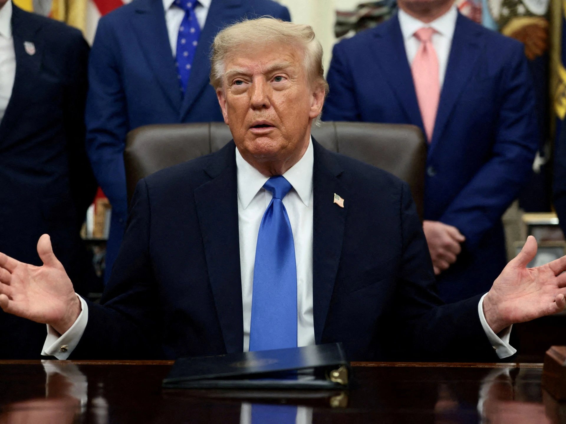 US judge blocks Trump visa caps as 20 states sue over green card rule
